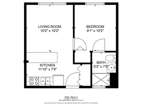 A floor plan for a small apartment with a living room, bedroom, kitchen, and bathroom.